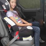 Teenager in car seat